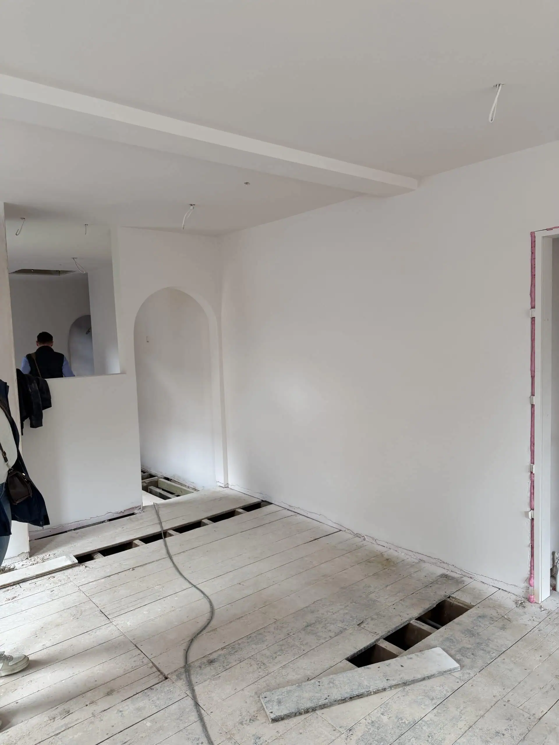 Interior of Monkey Puzzle Radlett nursery under construction with unfinished flooring.
